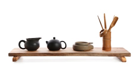 Beautiful set for traditional tea ceremony on white background Photo of Beautiful set for traditional tea ceremony on white background