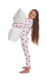 Cute girl wearing pajamas with pillow on white background Photo of Cute girl wearing pajamas with pillow on white background