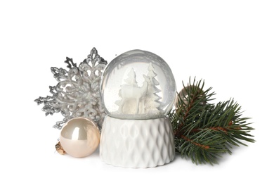 Beautiful snow globe and Christmas decor on white background Photo of Beautiful snow globe and Christmas decor on white background