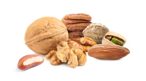 Mix of different tasty nuts on white background Image of Mix of different tasty nuts on white background