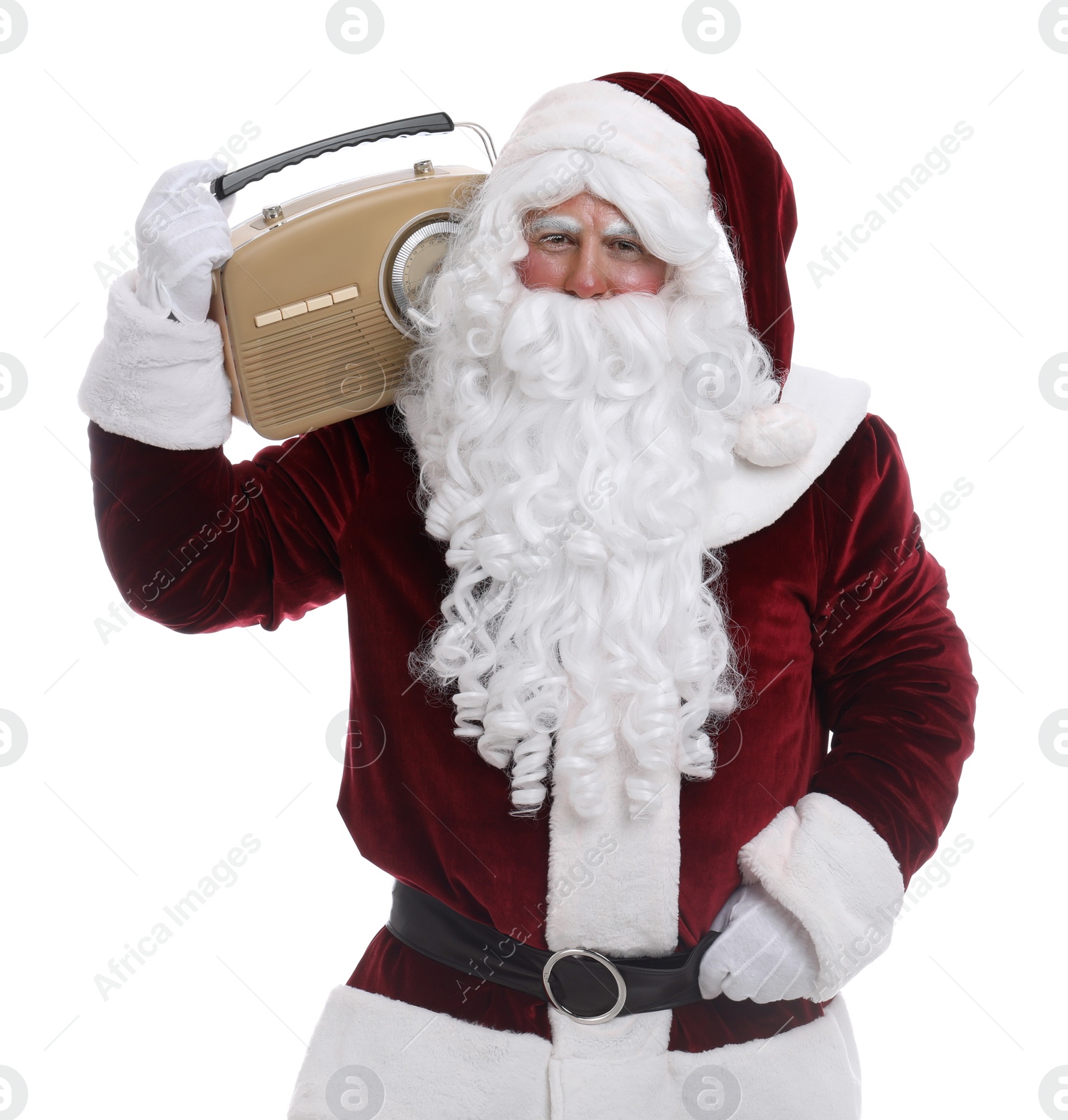 Santa Claus with vintage radio on white background. Christmas music Photo of Santa Claus with vintage radio on white background. Christmas music