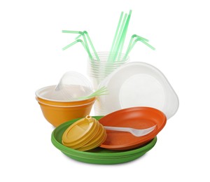 Pile of different plastic items on white background Photo of Pile of different plastic items on white background