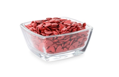 Bright heart shaped sprinkles in glass bowl isolated on white Photo of Bright heart shaped sprinkles in glass bowl isolated on white