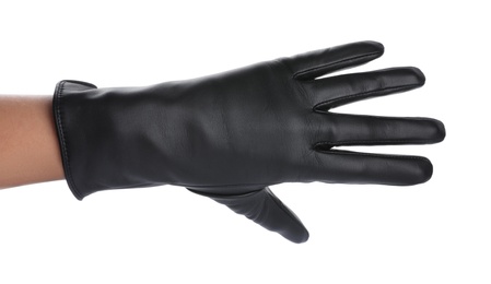 Woman wearing black leather glove on white background, closeup Photo of Woman wearing black leather glove on white background, closeup