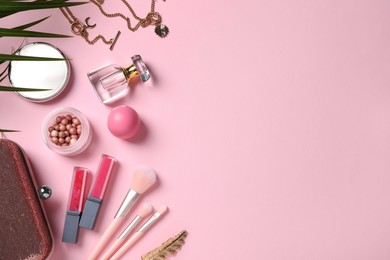 Flat lay composition with makeup products on pink background, space for text Photo of Flat lay composition with makeup products on pink background, space for text