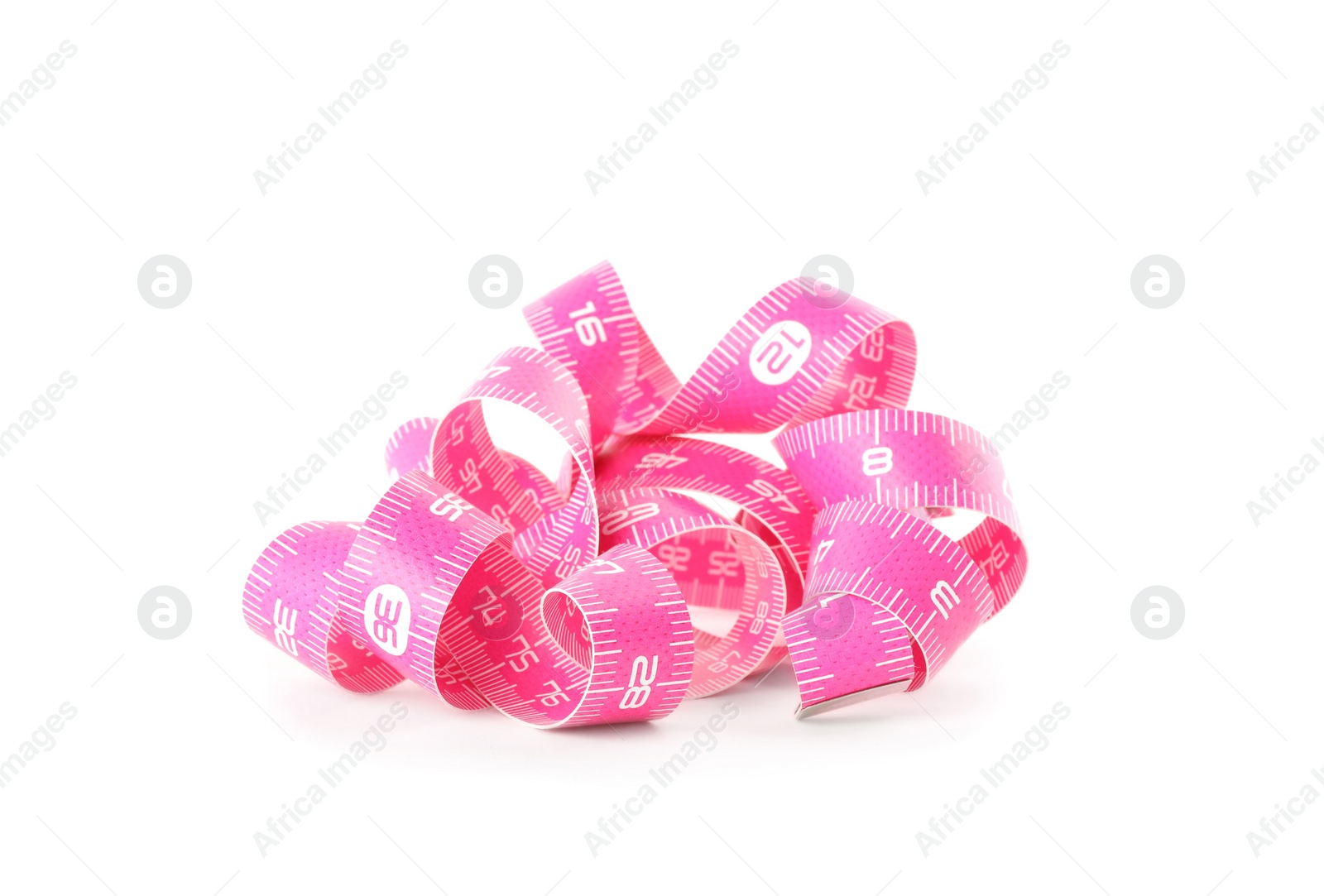 New pink measuring tape isolated on white Photo of New pink measuring tape isolated on white
