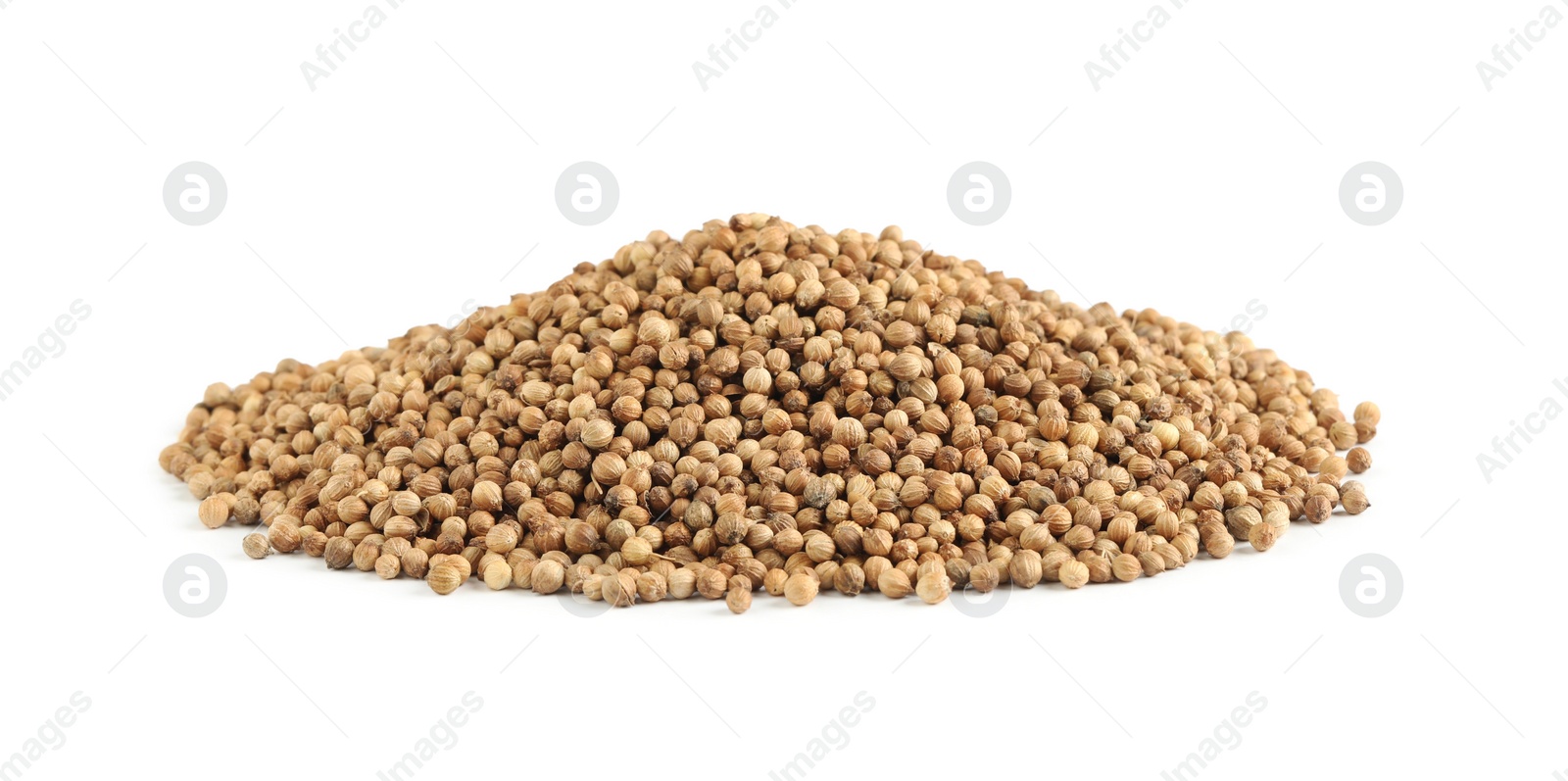 Heap of dried coriander seeds on white background Photo of Heap of dried coriander seeds on white background