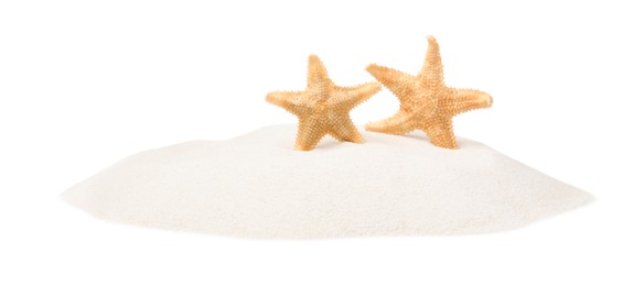 Beautiful sea stars in sand on white background Photo of Beautiful sea stars in sand on white background