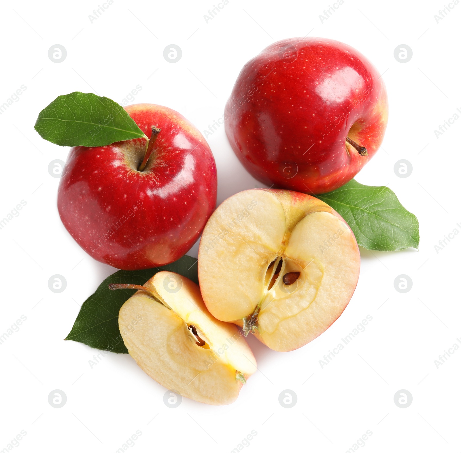 Ripe red apples with slices on white background Photo of Ripe red apples with slices on white background