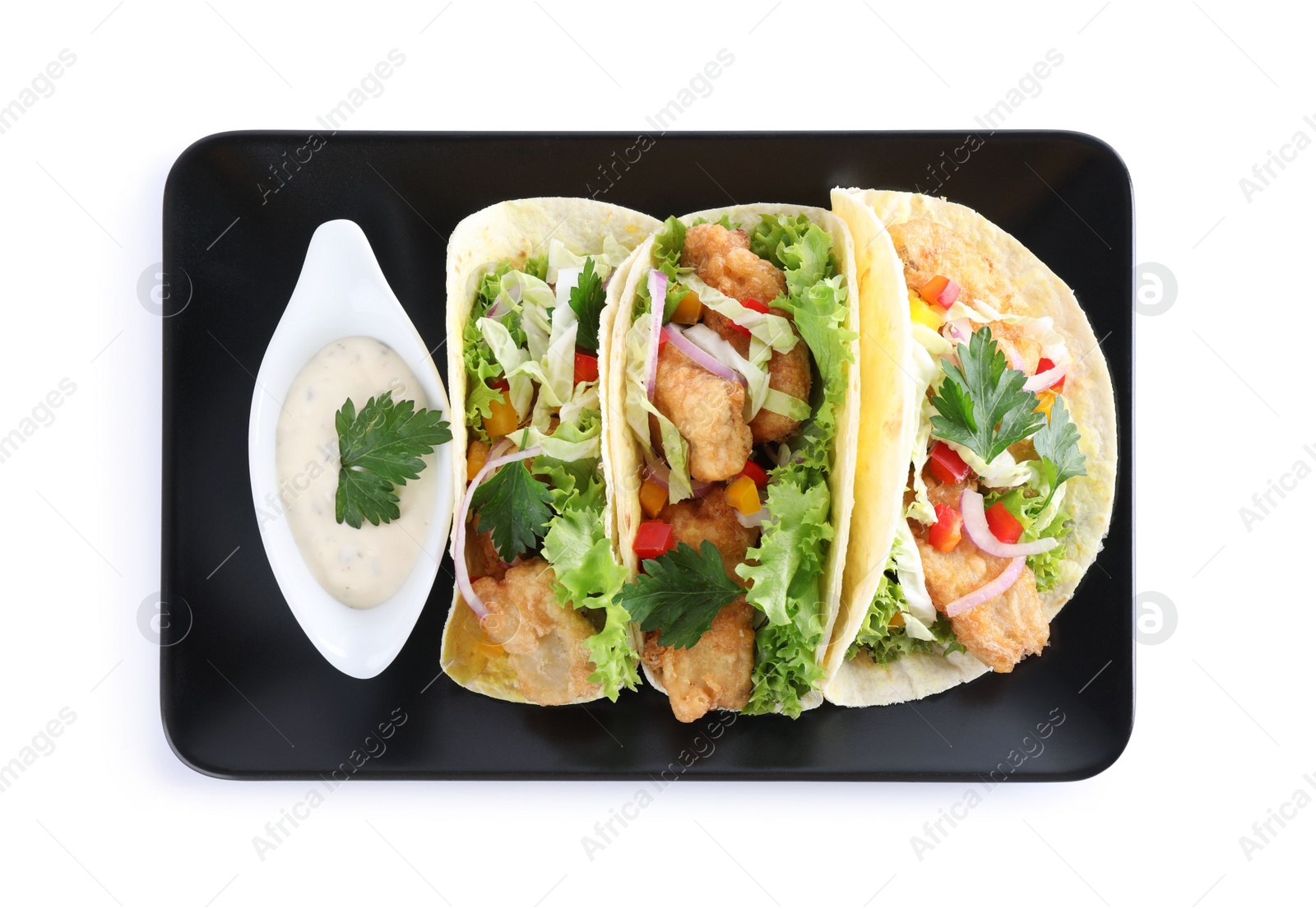Yummy fish tacos with sauce isolated on white, top view Photo of Yummy fish tacos with sauce isolated on white, top view