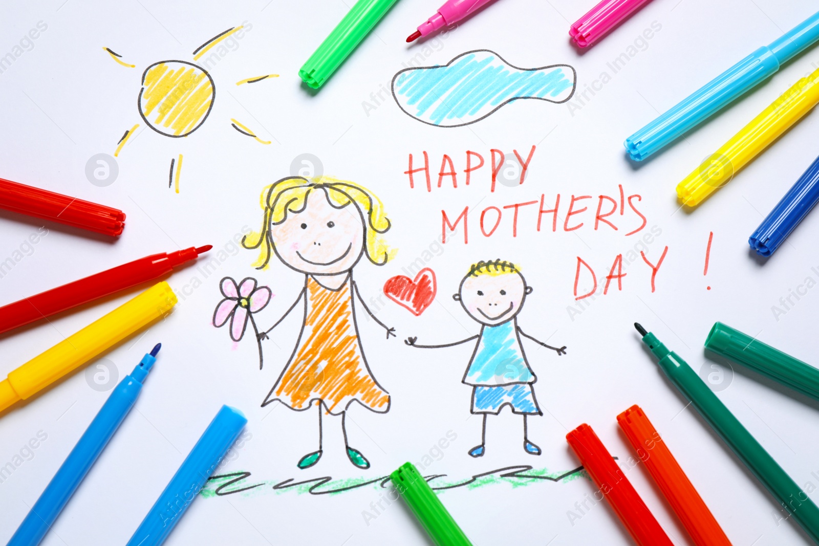 Drawing for Mother's day and felt tip pens, top view Photo of Drawing for Mother's day and felt tip pens, top view