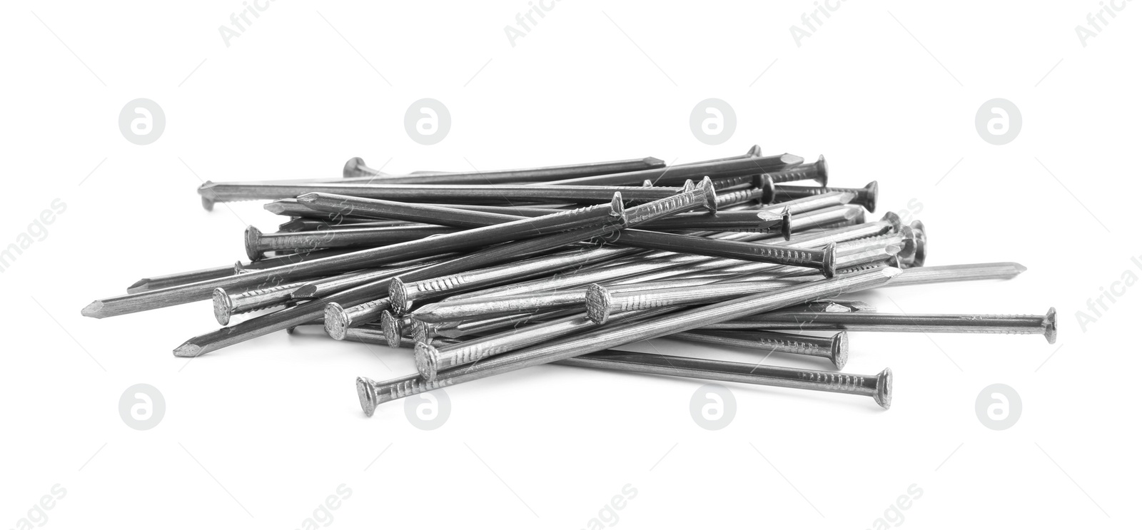 Pile of metal nails on white background Photo of Pile of metal nails on white background