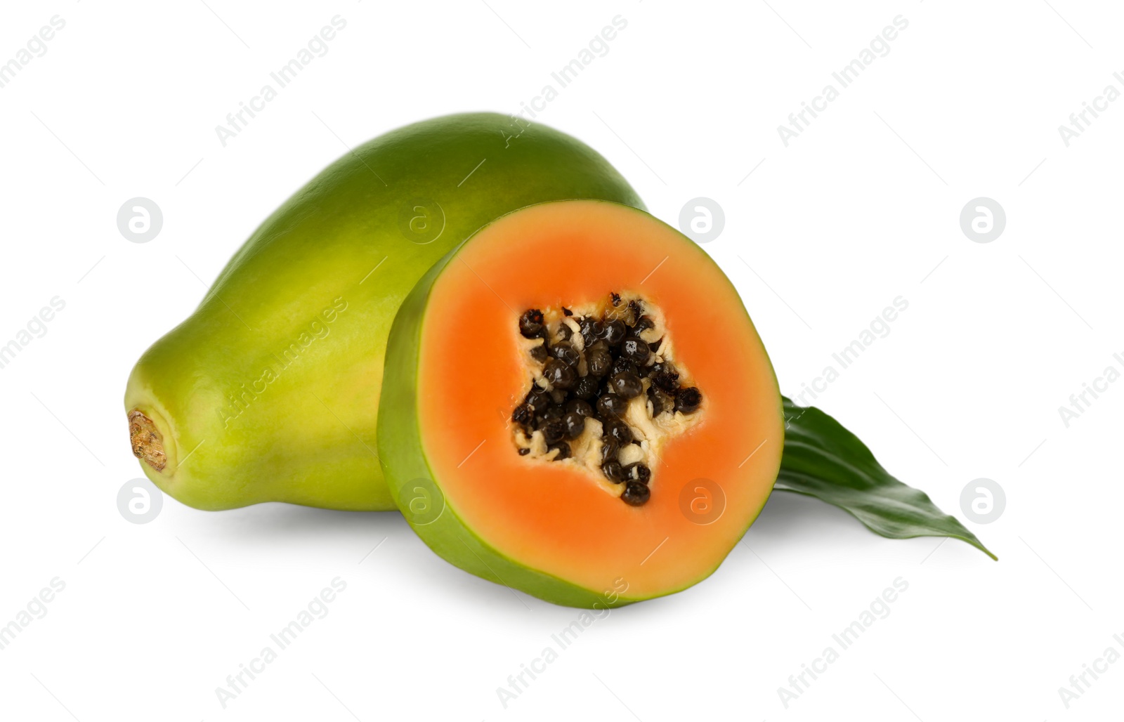 Fresh ripe papaya fruits with green leaf on white background Photo of Fresh ripe papaya fruits with green leaf on white background