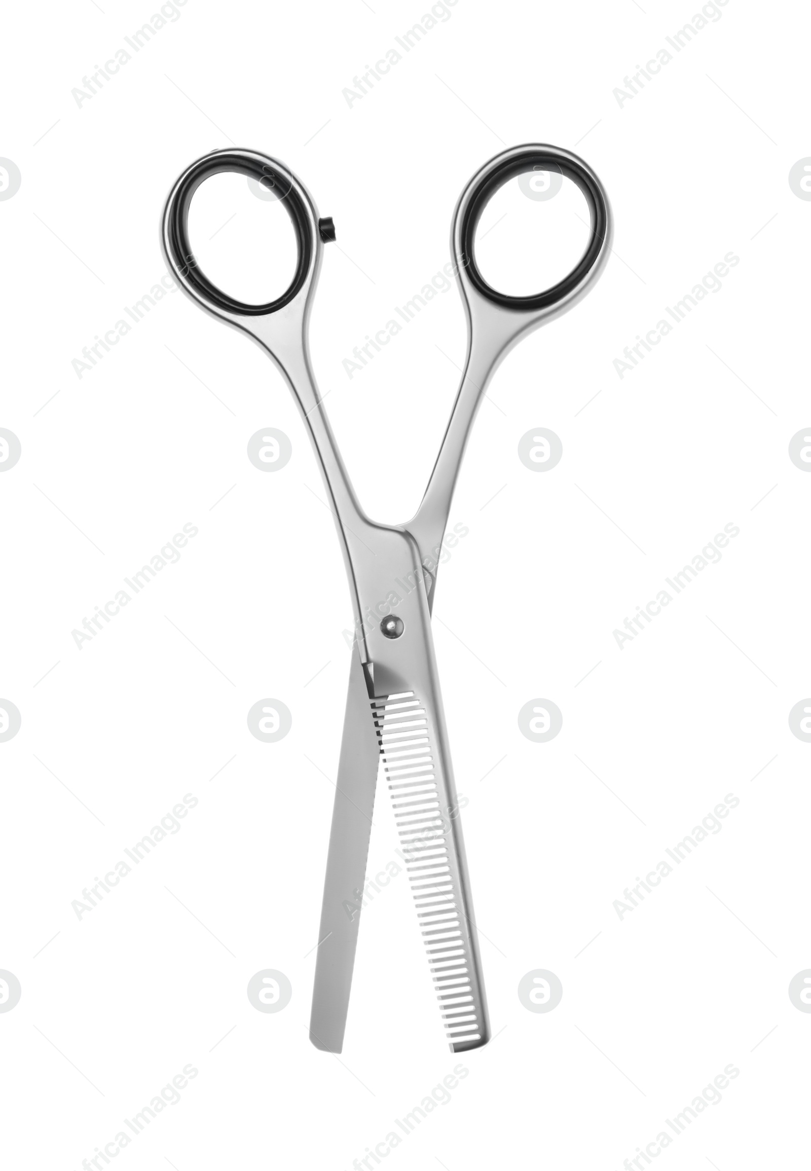Professional hairdresser thinning scissors isolated on white. Haircut tool Photo of Professional hairdresser thinning scissors isolated on white. Haircut tool