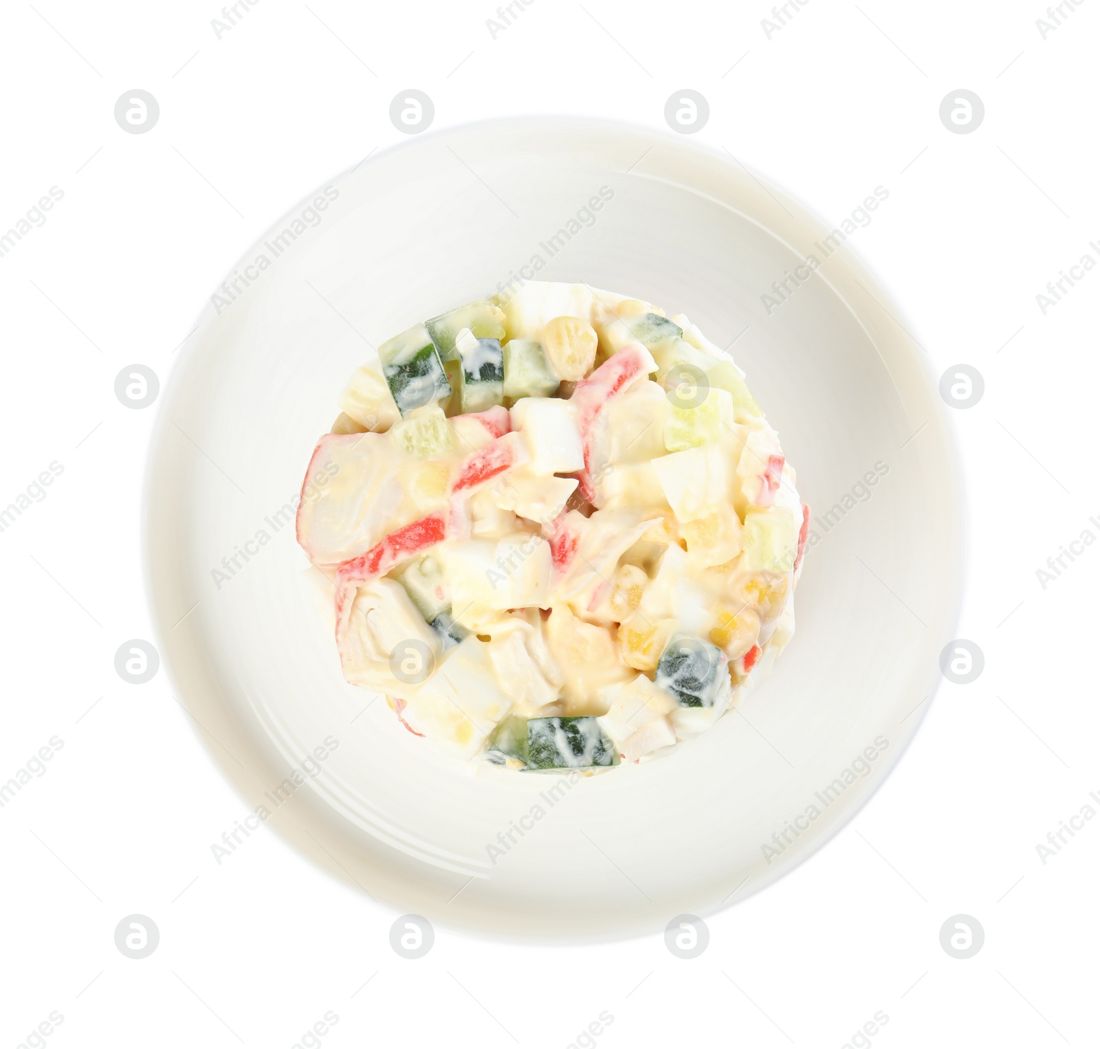 Delicious salad with fresh crab sticks on white background, top view Photo of Delicious salad with fresh crab sticks on white background, top view