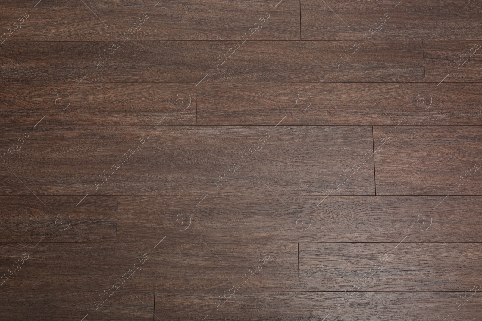 Photo of Clean wooden laminate as background, top view. Floor covering