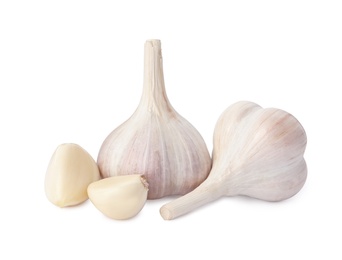 Fresh organic garlic bulbs and cloves on white background Photo of Fresh organic garlic bulbs and cloves on white background