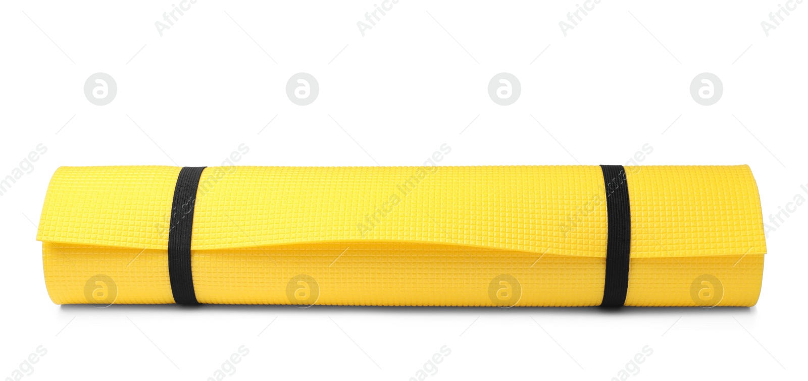 Yellow rolled mat isolated on white. Camping tourism equipment Photo of Yellow rolled mat isolated on white. Camping tourism equipment