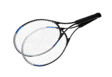 Tennis rackets on white background. Sports equipment Photo of Tennis rackets on white background. Sports equipment