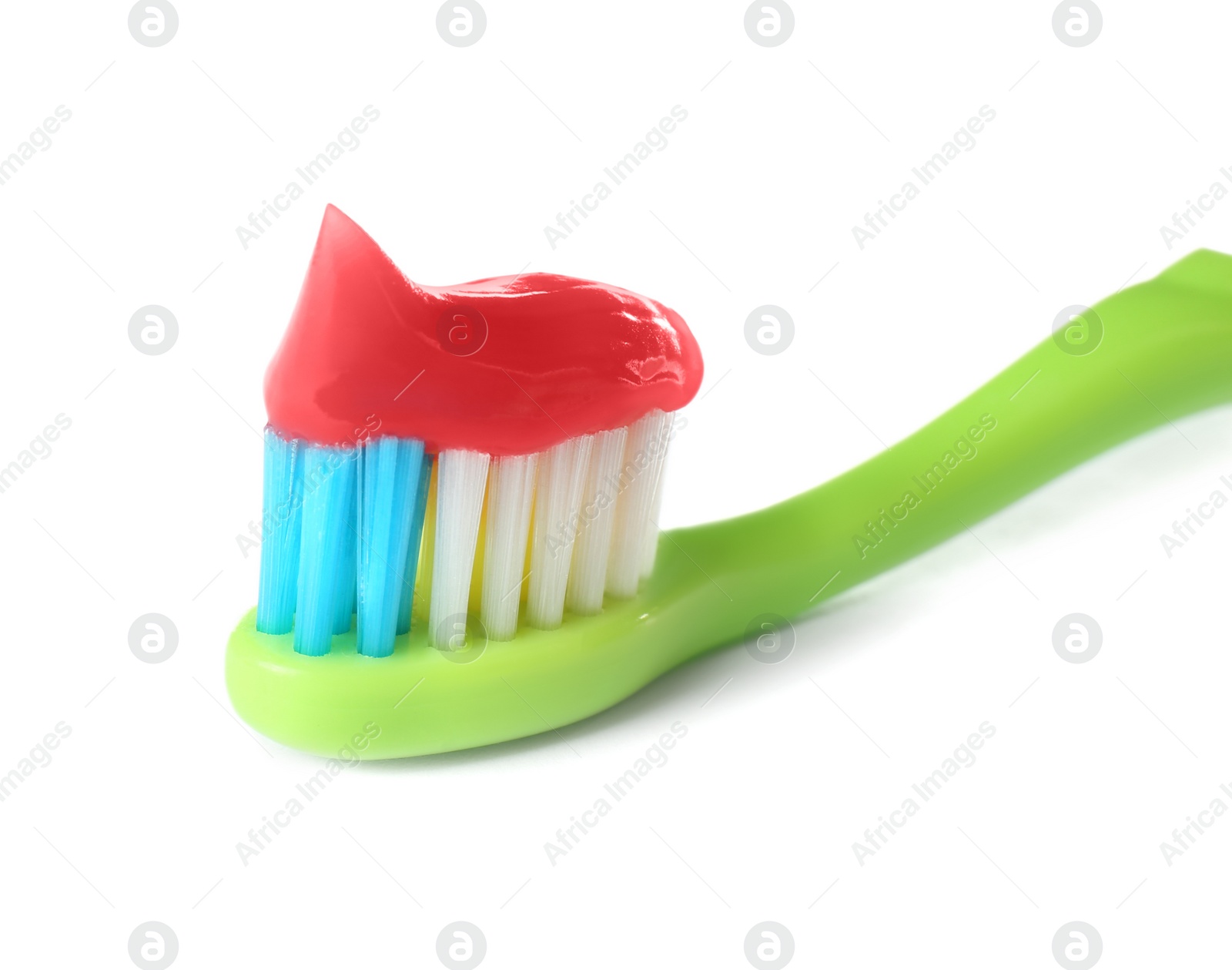 Toothbrush for children with paste isolated on white, closeup. Dental care Photo of Toothbrush for children with paste isolated on white, closeup. Dental care
