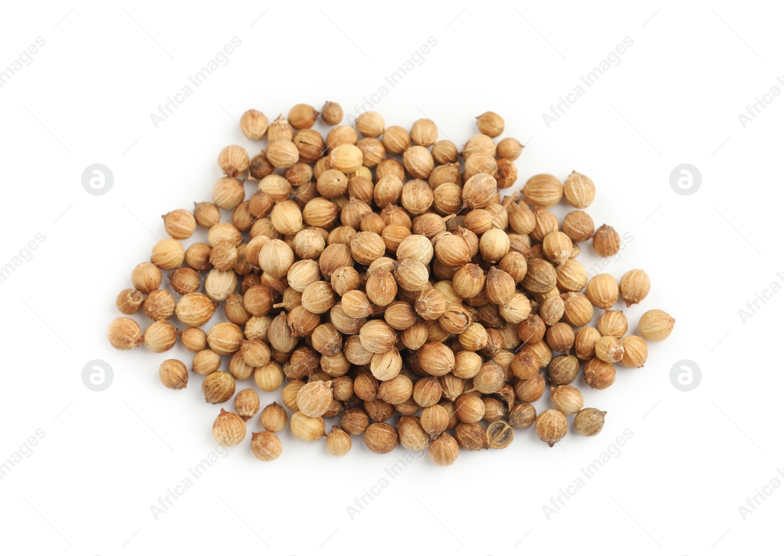 Photo of Heap of dried coriander seeds on white background, top view