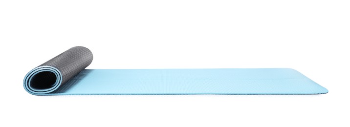 Light blue camping mat isolated on white Photo of Light blue camping mat isolated on white
