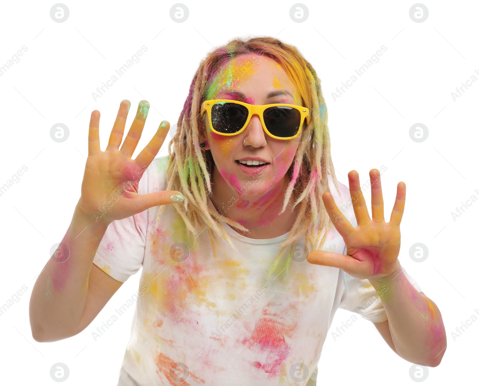 Woman covered with colorful powder dyes on white background. Holi festival celebration Photo of Woman covered with colorful powder dyes on white background. Holi festival celebration