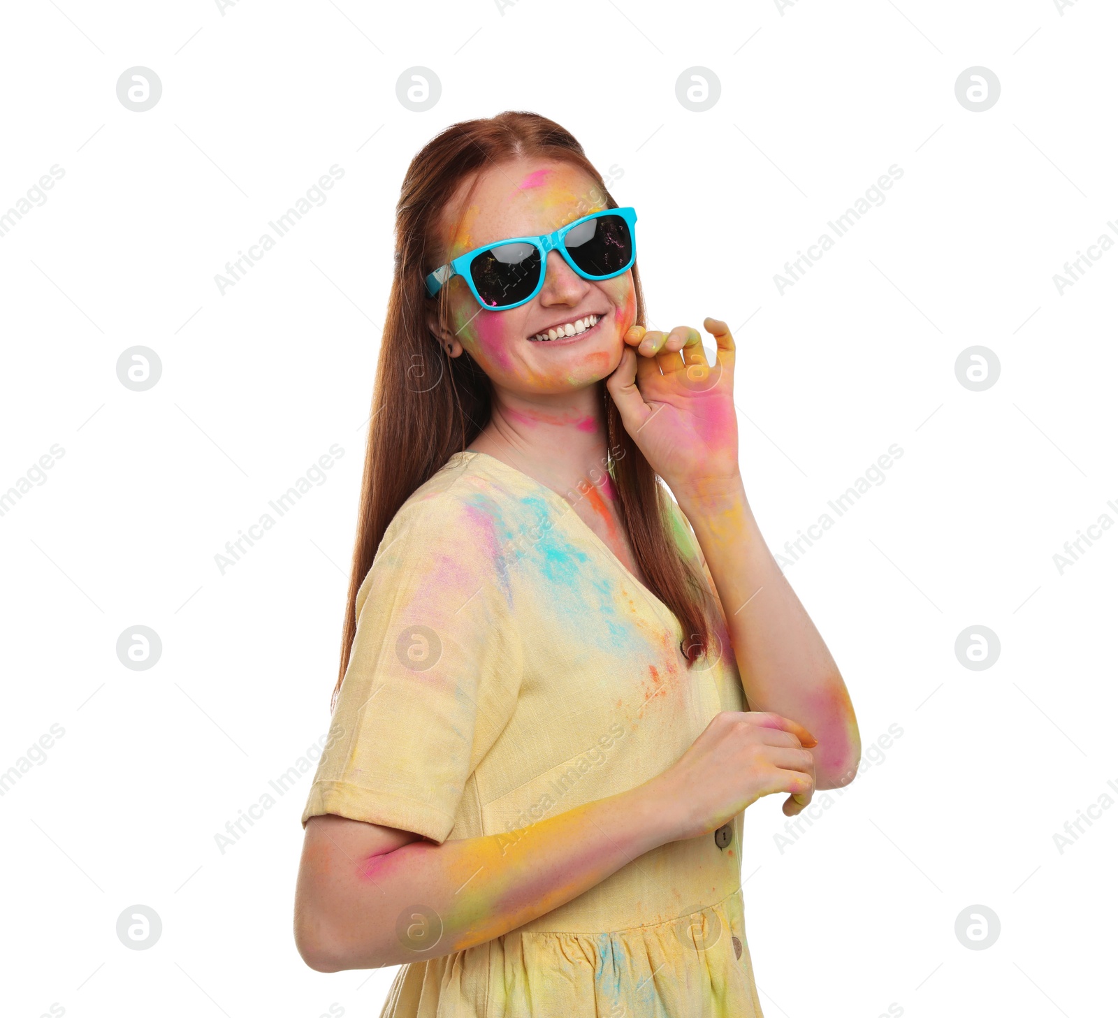 Woman covered with colorful powder dyes on white background. Holi festival celebration Photo of Woman covered with colorful powder dyes on white background. Holi festival celebration
