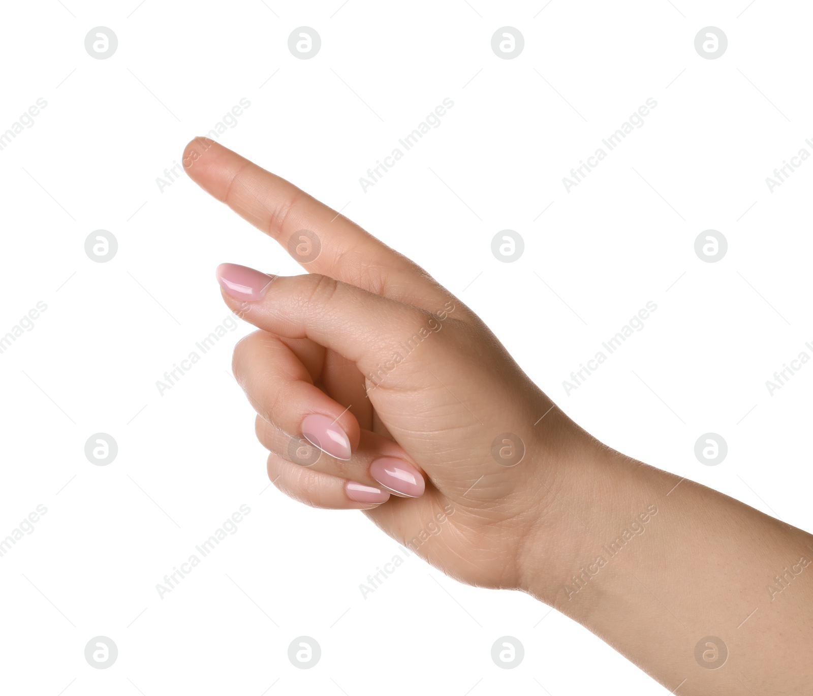 Woman pointing at something on white background, closeup Photo of Woman pointing at something on white background, closeup
