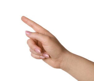 Woman pointing at something on white background, closeup Photo of Woman pointing at something on white background, closeup