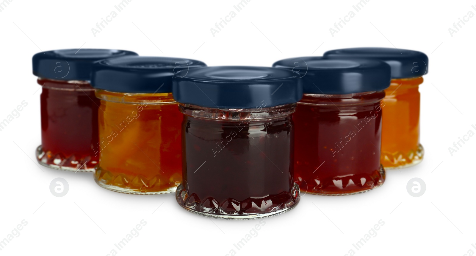 Jars with different jams on white background Photo of Jars with different jams on white background