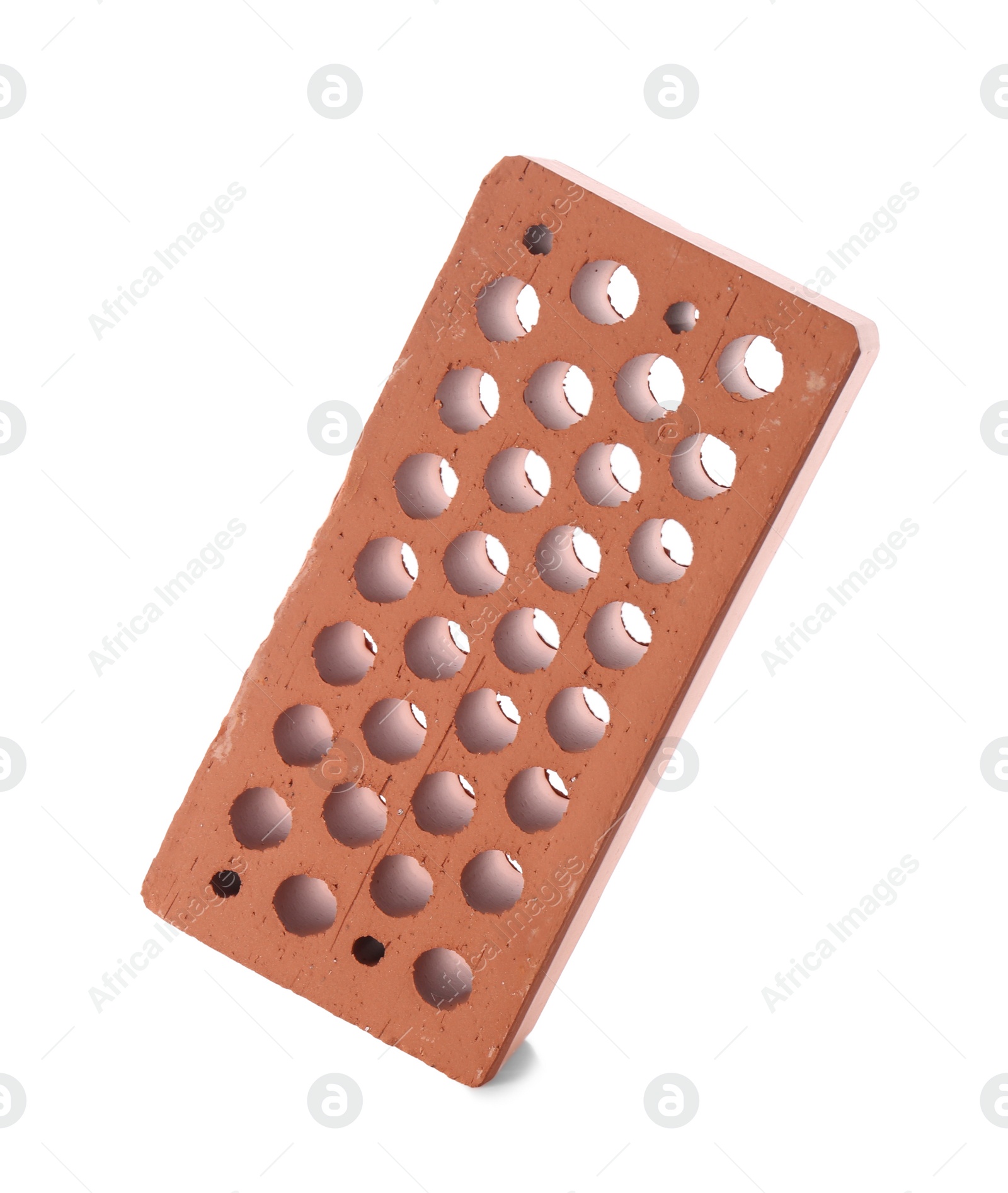 One red brick isolated on white. Building material Photo of One red brick isolated on white. Building material