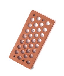 One red brick isolated on white. Building material Photo of One red brick isolated on white. Building material