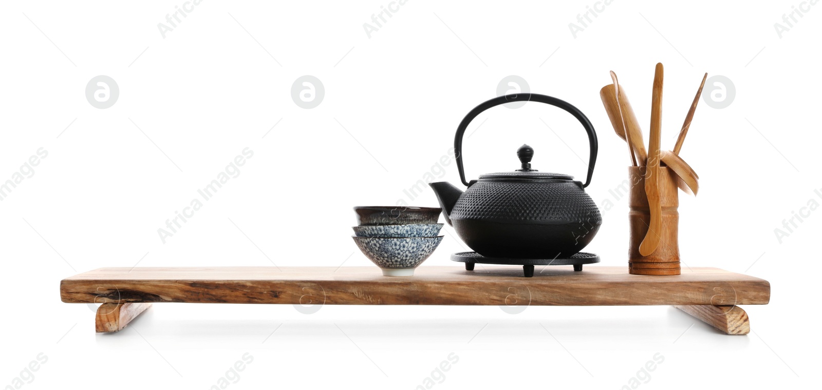 Beautiful set for traditional tea ceremony on white background Photo of Beautiful set for traditional tea ceremony on white background