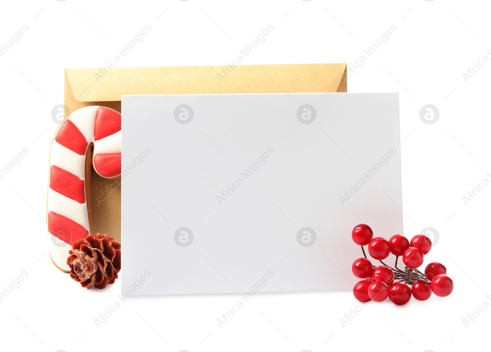 Blank greeting card, envelope and Christmas decor on white background, space for text Photo of Blank greeting card, envelope and Christmas decor on white background, space for text