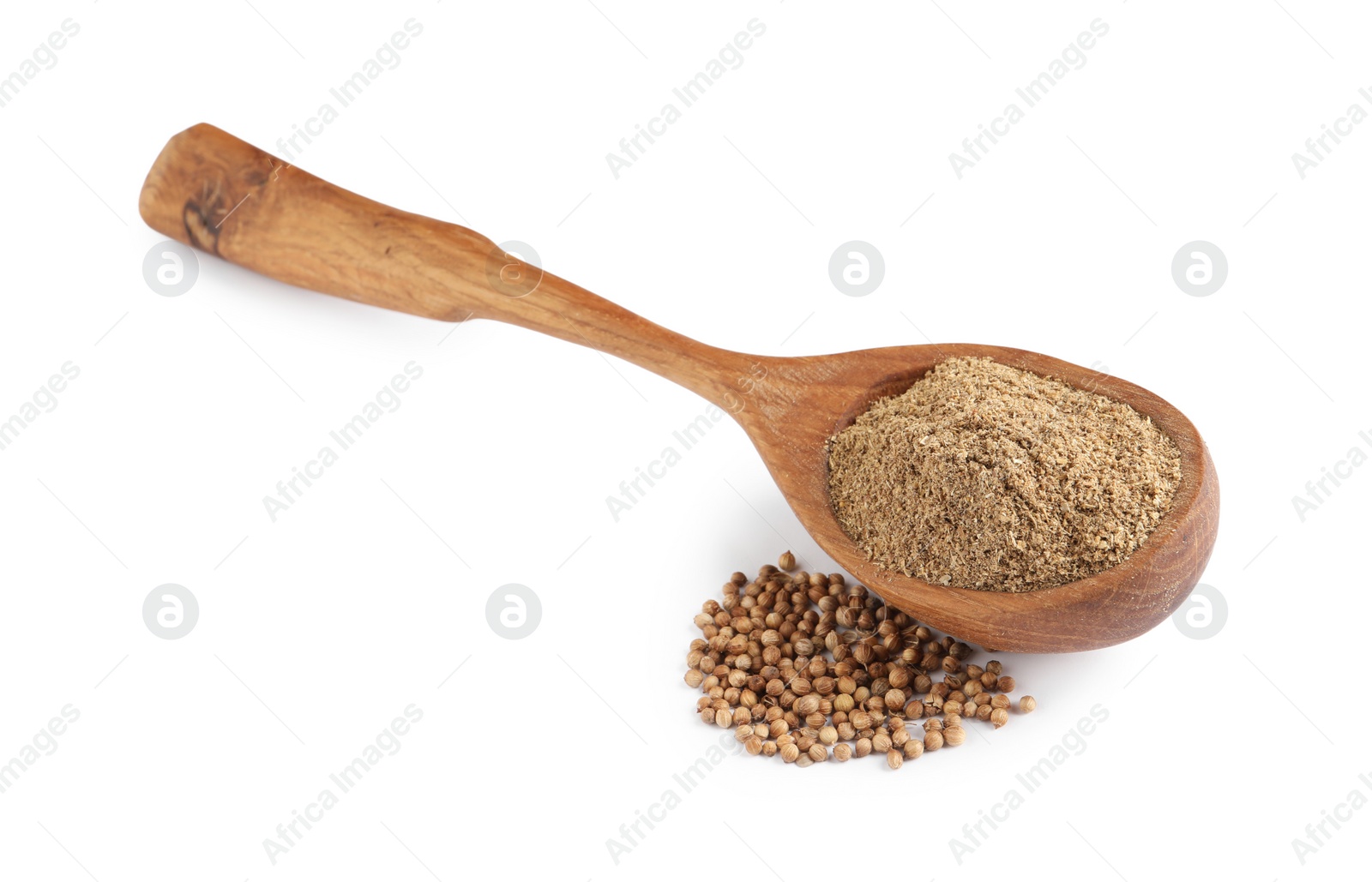 Wooden spoon with powdered coriander and corns on white background Photo of Wooden spoon with powdered coriander and corns on white background