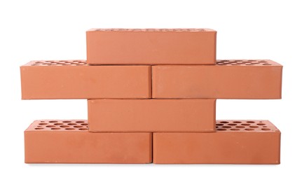 Many red bricks on white background. Building material Photo of Many red bricks on white background. Building material