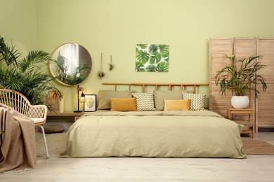 Photo of Stylish bedroom with modern furniture. Interior design