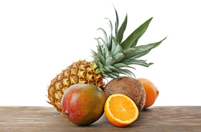 Set of fresh tropical fruits on wooden table Photo of Set of fresh tropical fruits on wooden table