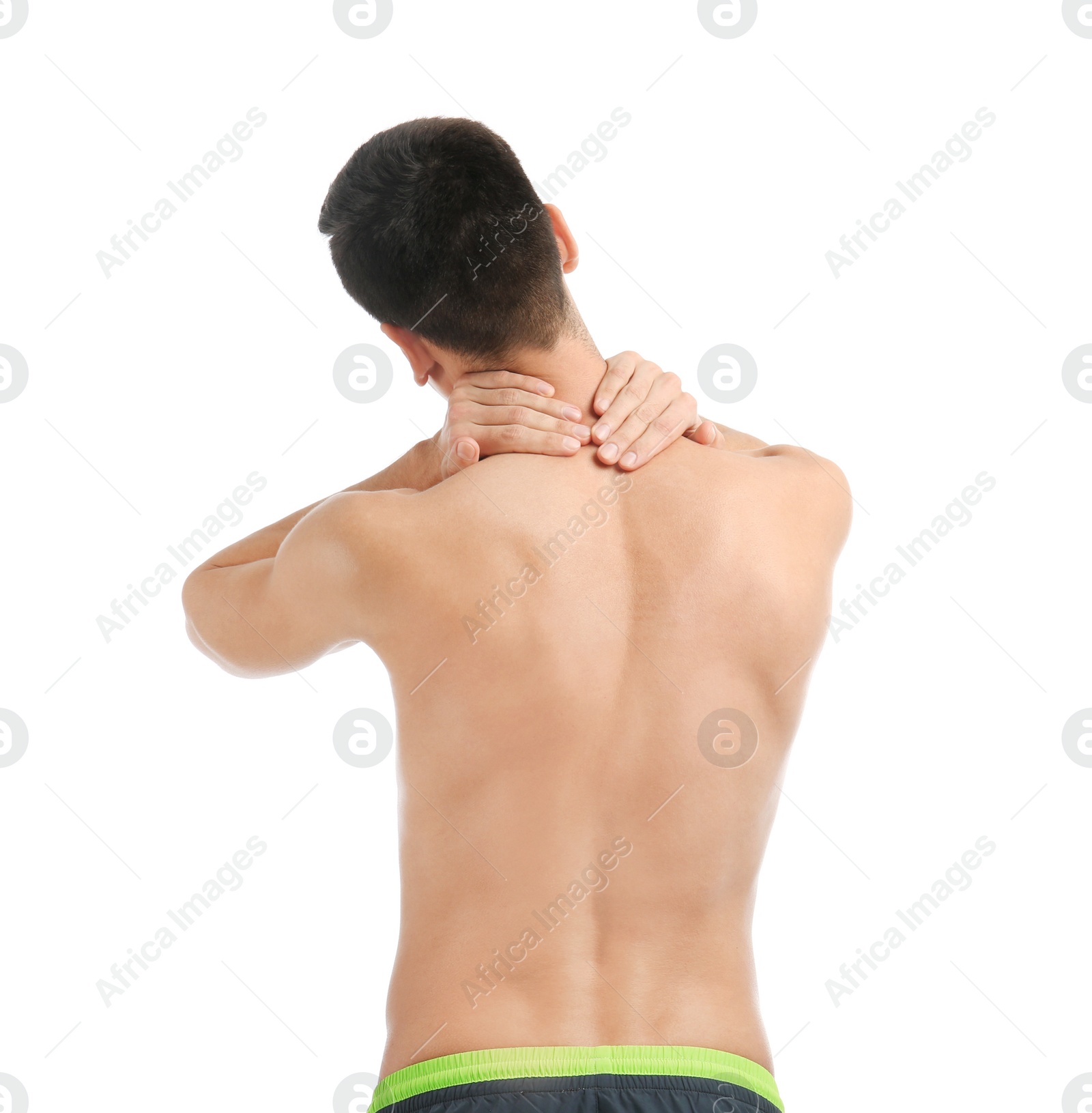 Young man suffering from neck pain on white background Photo of Young man suffering from neck pain on white background