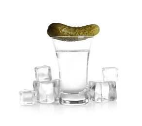 Russian vodka, pickle and ice cubes isolated on white Photo of Russian vodka, pickle and ice cubes isolated on white