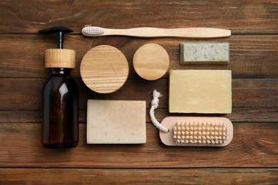 Eco friendly personal care products on wooden table, flat lay Photo of Eco friendly personal care products on wooden table, flat lay