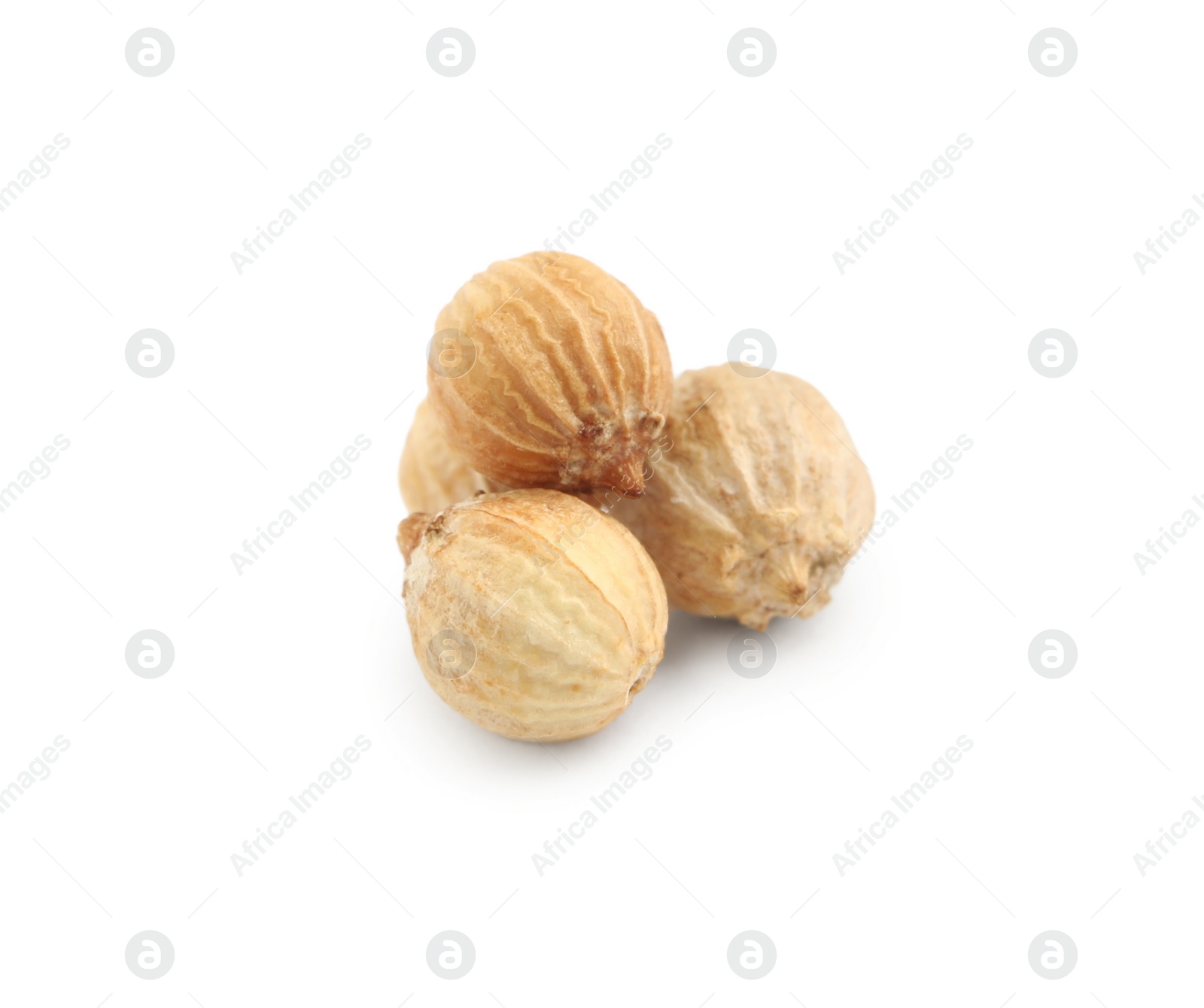 Photo of Heap of dried coriander seeds on white background, closeup