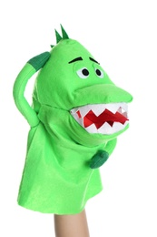 Dinosaur puppet for show on hand against white background Photo of Dinosaur puppet for show on hand against white background