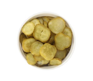 Photo of Slices of tasty pickled cucumbers in bowl isolated on white, top view