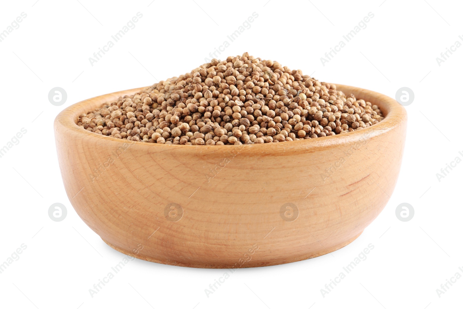 Dried coriander seeds in wooden bowl on white background Photo of Dried coriander seeds in wooden bowl on white background