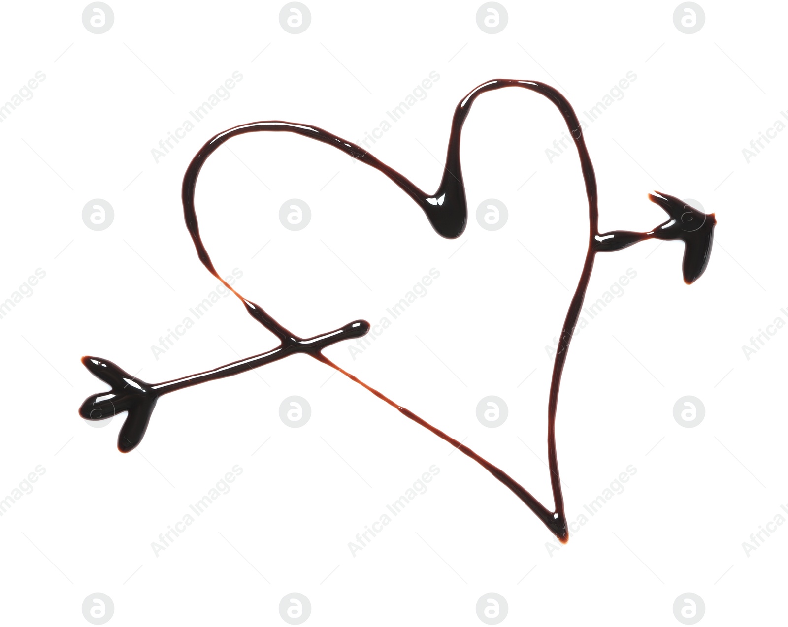 Heart and arrow drawn with dark chocolate on white background, top view Photo of Heart and arrow drawn with dark chocolate on white background, top view