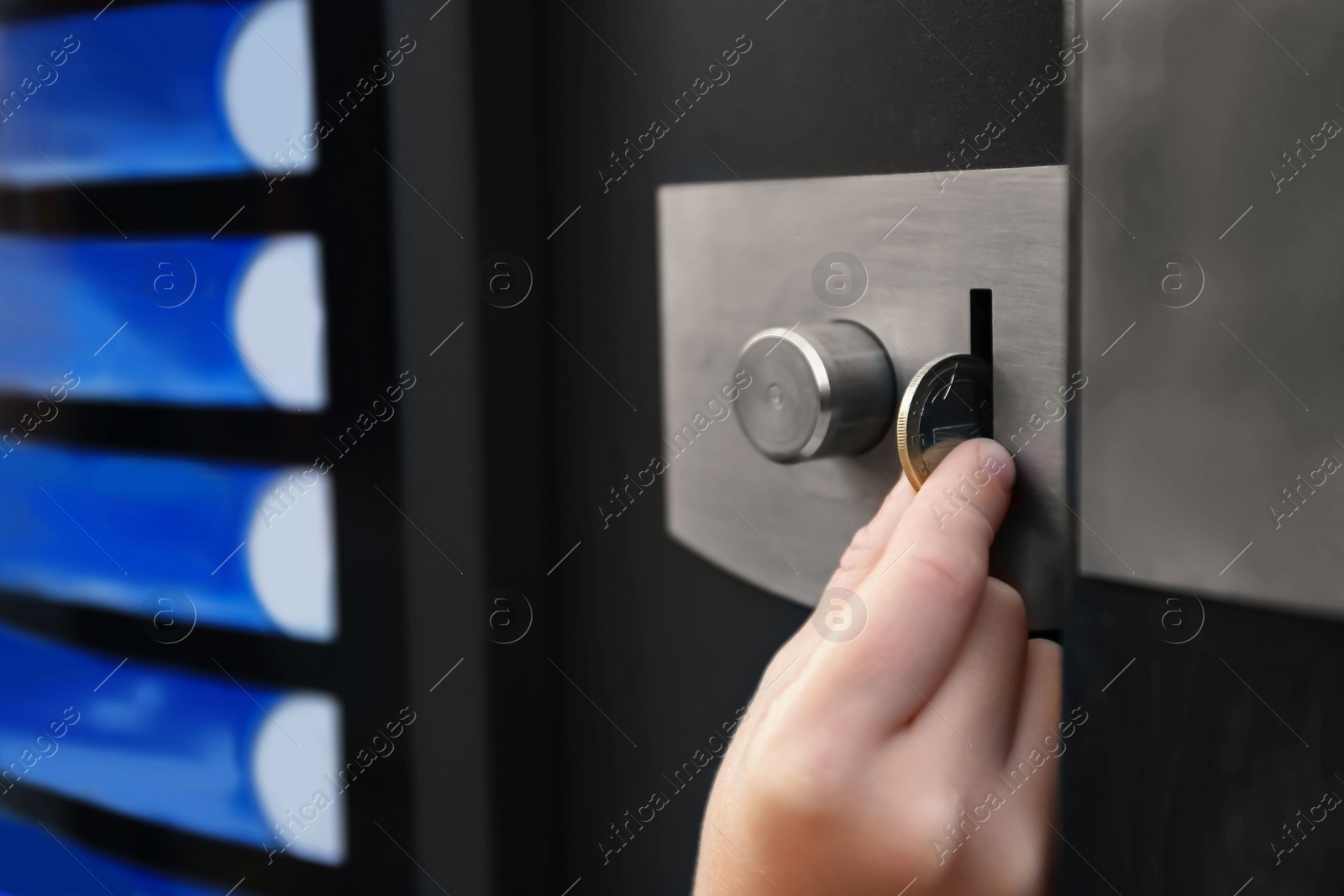 Using coffee vending machine. Girl inserting coin into acceptor, closeup with space for text Photo of Using coffee vending machine. Girl inserting coin into acceptor, closeup with space for text