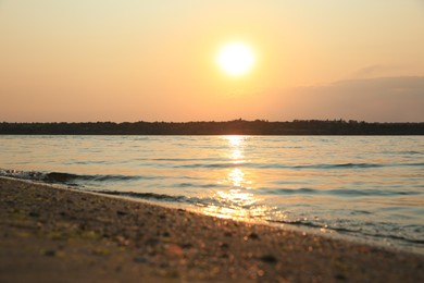 Landscape with beautiful sunset over calm river Photo of Landscape with beautiful sunset over calm river