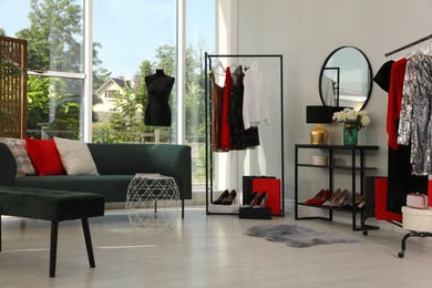 Modern wardrobe room interior with stylish furniture Photo of Modern wardrobe room interior with stylish furniture